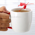 280cc Porzellan Teetasse mit gummiertem Griff und Butterfly Infuser